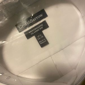 White long sleeve dress shirt with a button down collar